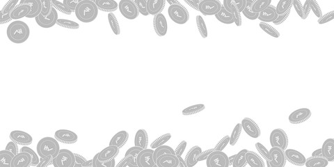 Indian rupee coins falling. Scattered black and wh