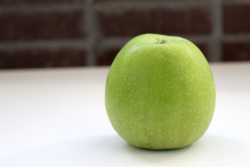 apple on green background