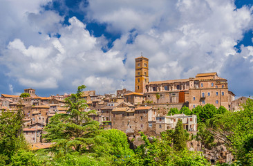 Fototapeta na wymiar The old town of Sutri among clouds, a beautiful medieval city near Rome, along the famous pilgrim route knows as 'Via Francigena'