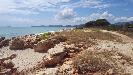 view of the coast of sardinia with stones