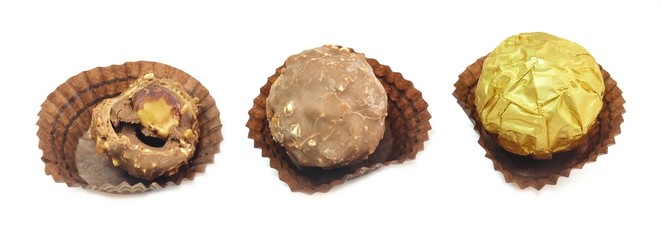 Brown Round Chocolate Candies in Paper Package