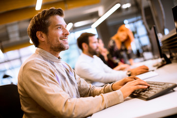 Young business people working in office