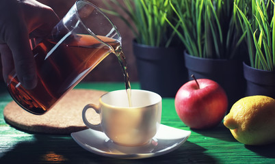 Brewing tea on a wooden table
