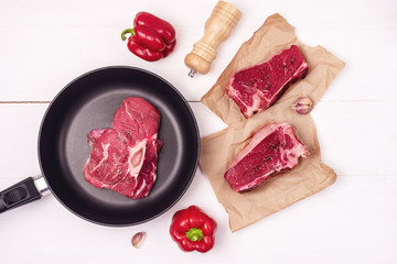 Fresh Raw Beef Meat on Pan Steak White Wooden Background Top View