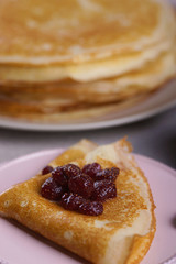 Breakfast with pancakes on a textured background