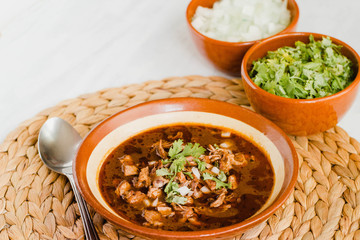 Traditional birria de res from Mexico, on a white background