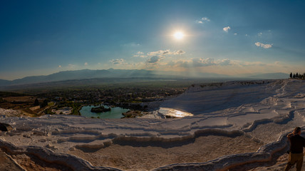 Pamukkale mineral-rich thermal waters flowing down white travertine terraces, Turkey 