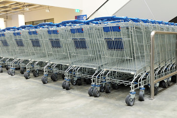 Row of shopping cart in store  © chanokpan