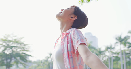 young asain woman feel freedom