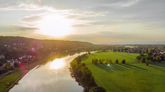 Drone Timelapse of sunrise river Elbe meadow in Dresden, Germany