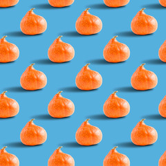 seamless pattern of pumpkins on a blue background