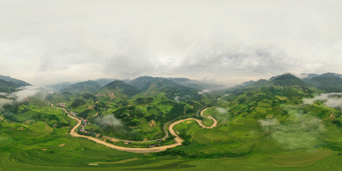 360 panorama by 180 degrees angle seamless panorama view of paddy rice terraces, green agricultural...