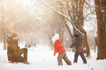 Children in winter park play