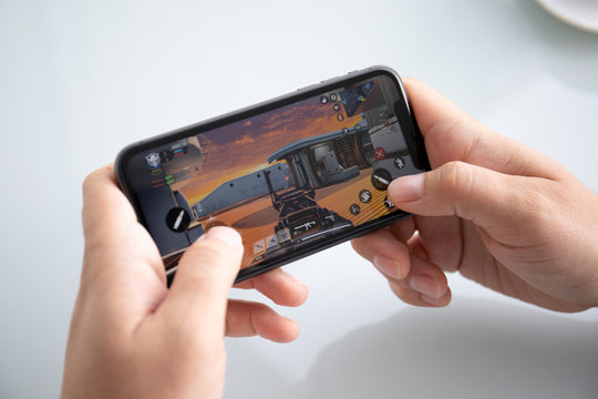 Man Hand Holding IPhone 11 Game Call Of Duty Mobile