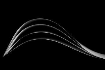 curved white sheets of paper against a dark background