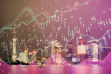 Financial graph on night city scape with tall buildings background double exposure. Analysis concept.