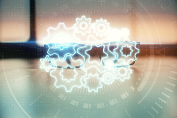 Fototapeta premium Business theme hologram with glasses on the table background. Concept of search. Double exposure.