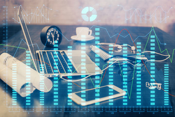 Double exposure of chart and financial info and work space with computer background. Concept of...