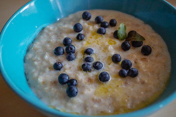  Porridge with blueberries in a plate