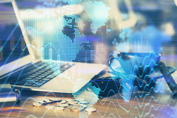 Multi exposure of forex graph and work space with computer. Concept of international online trading.