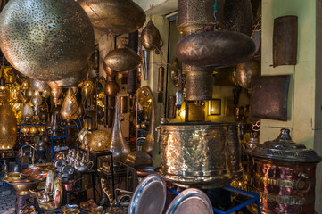 Oriental lampshades and souvenirs / Oriental lampshades and trays in a souk.