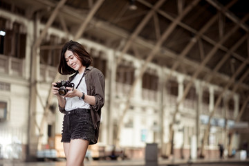 Young Asian travel woman is enjoying with beautiful place in Bangkok, Thailand