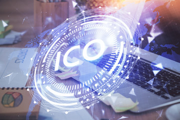 Multi exposure of blockchain theme hologram and table with computer background. Concept of bitcoin...
