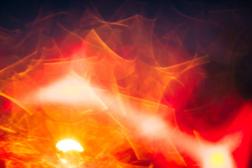 golden bokeh on a black background, garland lights blurred festive  abstract backdrop