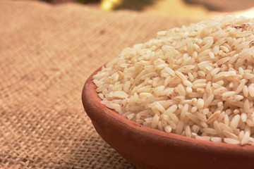 rice in mud bowl and pot