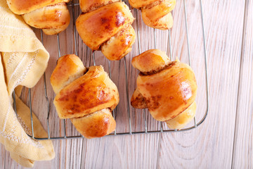Spicy sweet rolls on wire rack