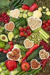 Health food for vegans with fruit, vegetables, herbs, nuts, legumes, pasta, grains & cereals. High in vitamins, minerals, antioxidants, fibre, omega 3, protein and smart carbs. Flat lay.