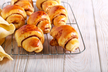 Spicy sweet rolls on wire rack