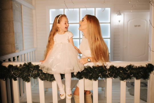 Mom spend tima in winter holiday with her daughter. Christmas mood
