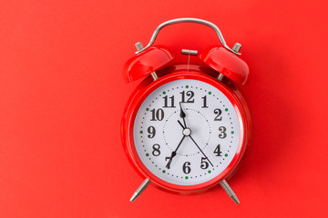 Red Alarm Clock On Red Background With Copy space