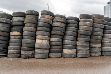 Pile of old car tires on the ground