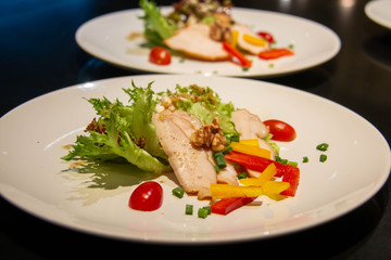 A slice chicken salad on plate