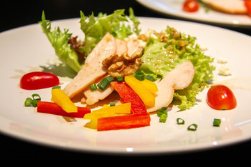 A slice chicken salad on plate