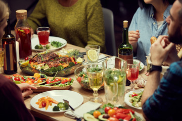 Cropped image of delicious homemade food at dinner table during house party, copy space