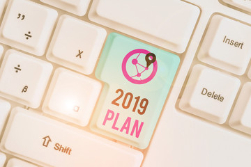 Conceptual hand writing showing 2019 Plan. Concept meaning setting up your goals and plans for the...