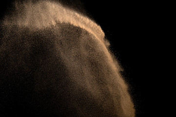 Sand, isolated on black background.