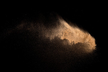 Sand, isolated on black background.