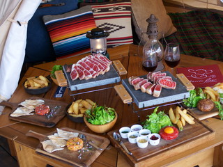 Wooden table and meat dish