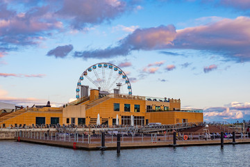 Fototapeta na wymiar Helsinki. Finland. Ferris wheel in Helsinki. SkyWheel. The embankment of the quay of Katajanokka. Uusimaa. Impressions from travel to Scandinavia. Sightseeing In Helsinki.