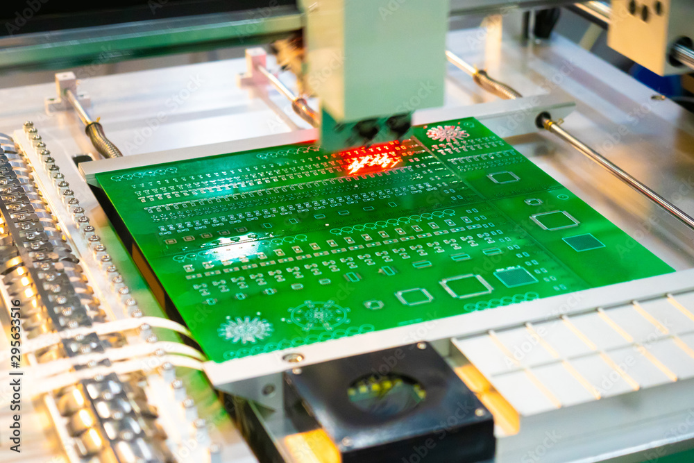Poster production of printed circuit boards. the machine assembles the printed circuit board in accordance 