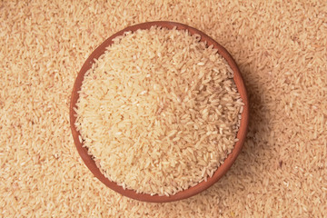 Fototapeta na wymiar rice in mud bowl and pot