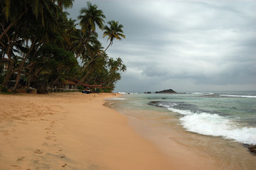 Fototapeta na wymiar Have fun at the oceanside in Dalawella, Sri Lanka