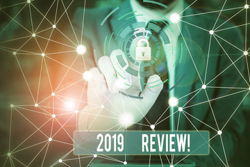 Writing note showing 2019 Review. Business concept for remembering past year events main actions or good shows Picture photo network scheme with modern smart device