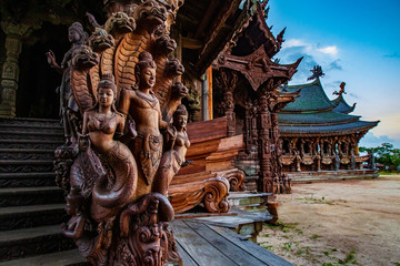 Thailand. Temple of truth in Pattaya. Fragment of wood carving. Mythological creatures carved from...