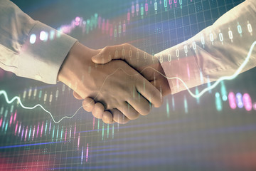 Multi exposure of forex graph on abstract background with two businessmen handshake. Concept of success on stock market