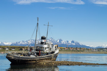 Fototapeta na wymiar Beached ship on Ushuaia port, Argentina landscape